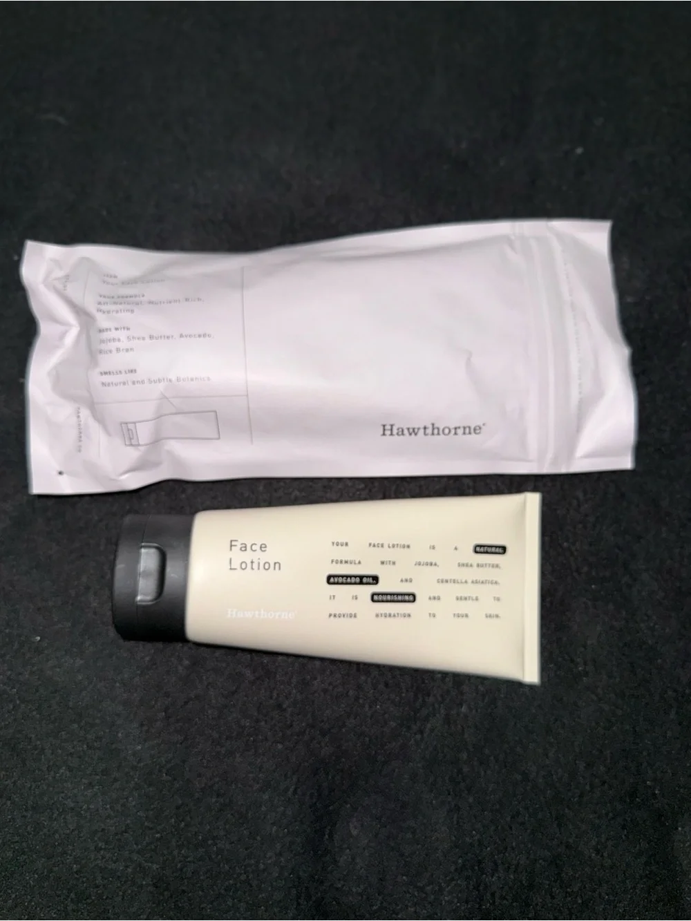 Nike Hydrating Face Lotion – Pale Pink & Black Tube